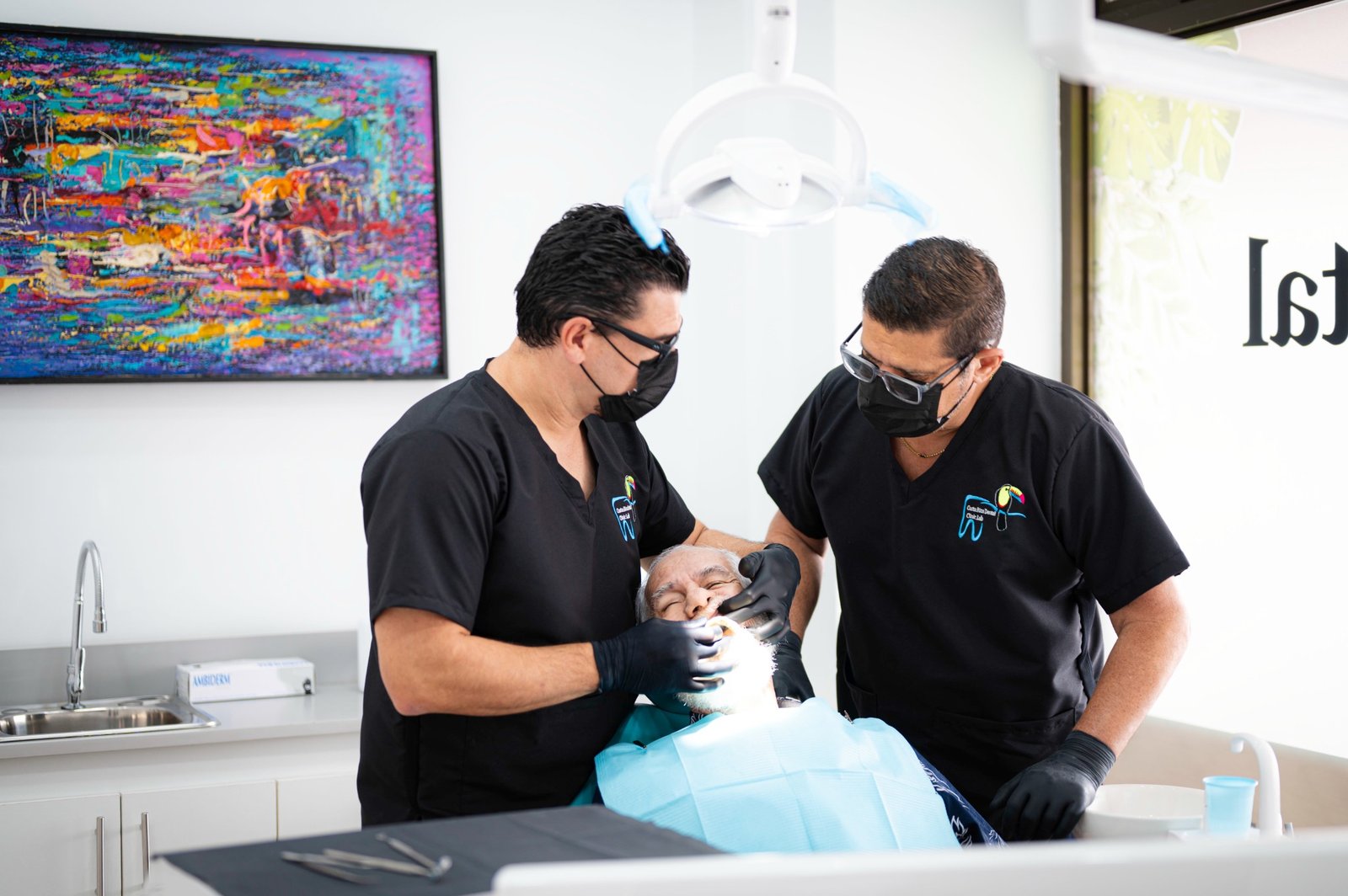 Dentists treating a patient at Costa Rica Dental Clinic Lab